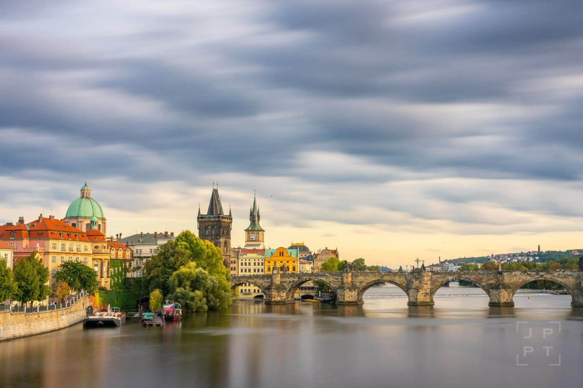 Charles bridge with moving clouds, Prague